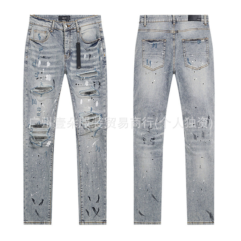 Amiri Distressed Splash‑Ink Stretch Slim Tapered Denim Jeans Unisex
