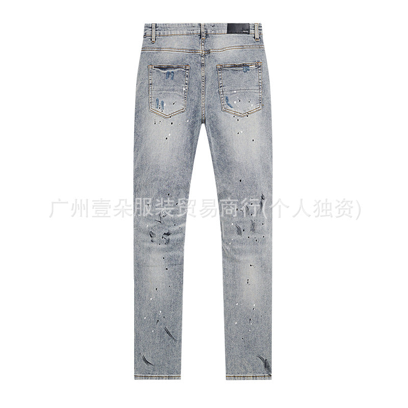 Amiri Distressed Splash‑Ink Stretch Slim Tapered Denim Jeans Unisex
