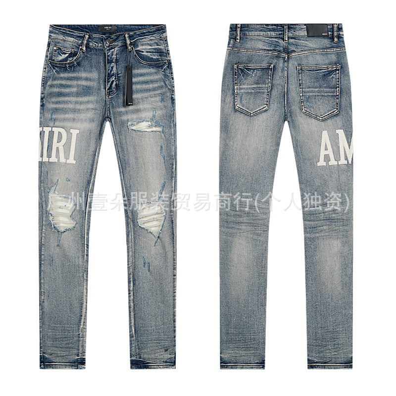 Amiri Distressed Splash‑Ink Stretch Slim Tapered Denim Jeans Unisex