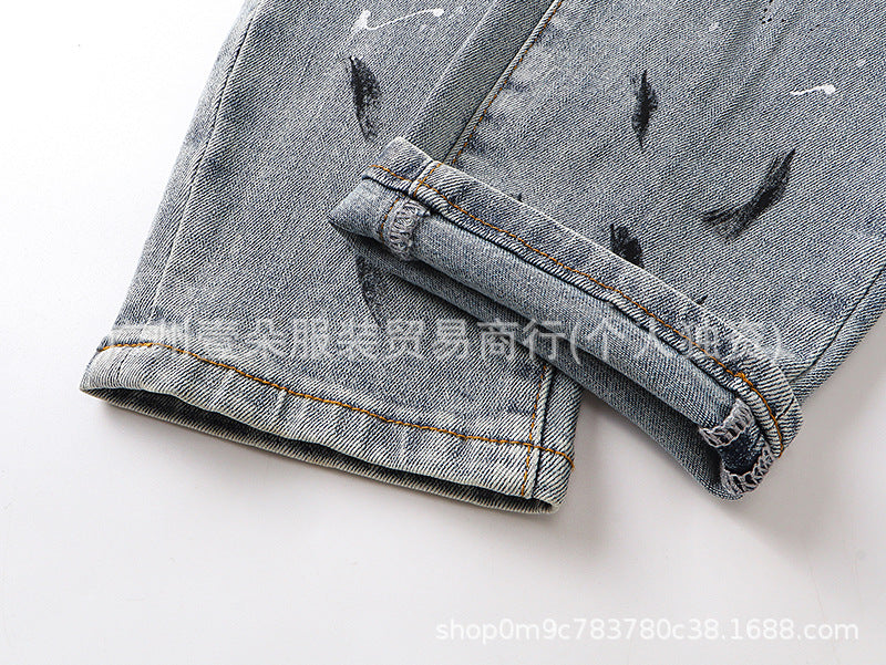 Amiri Distressed Splash‑Ink Stretch Slim Tapered Denim Jeans Unisex