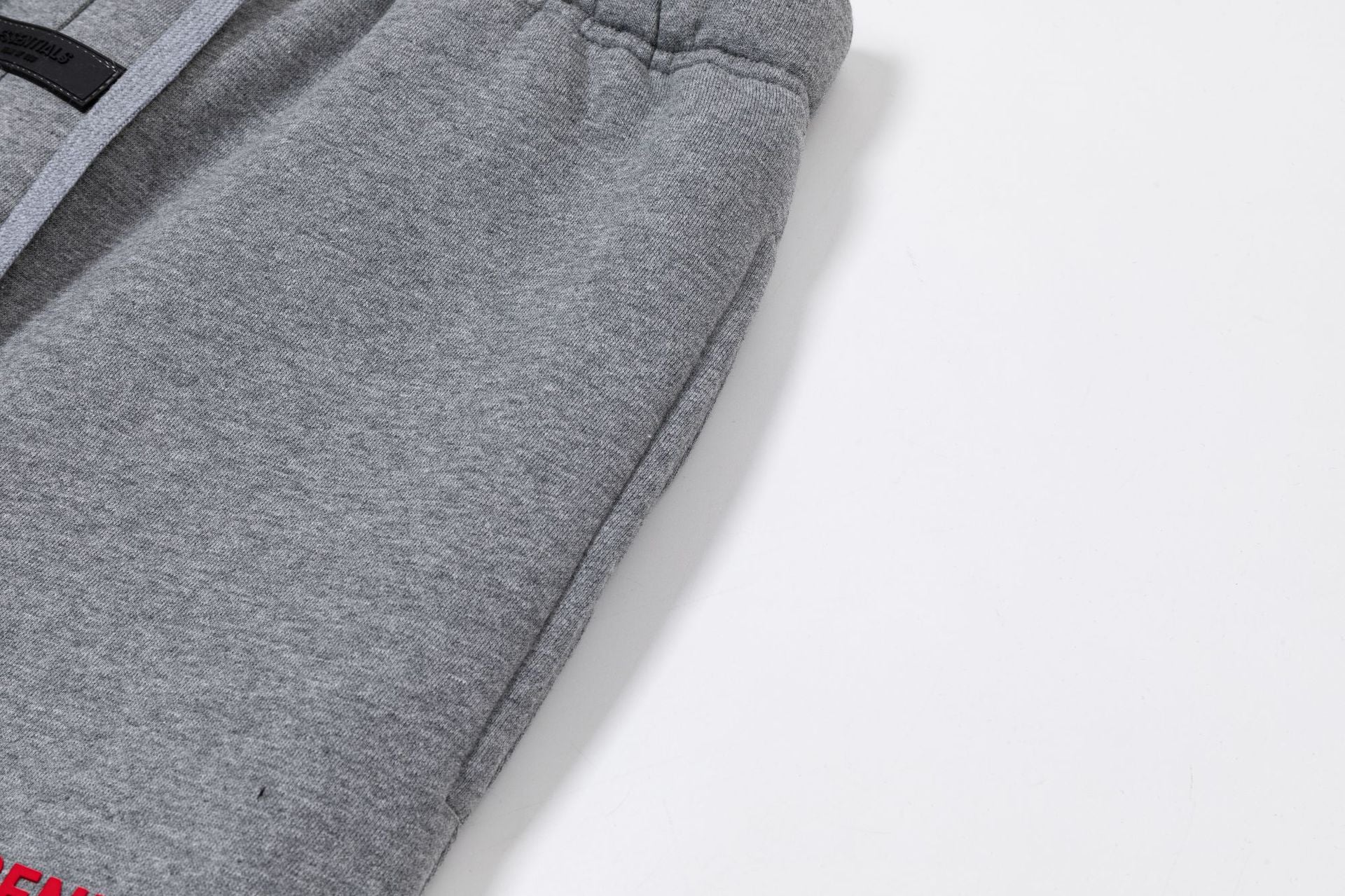 Fear Of God Essentials Red Rubber Letter Casual Pants