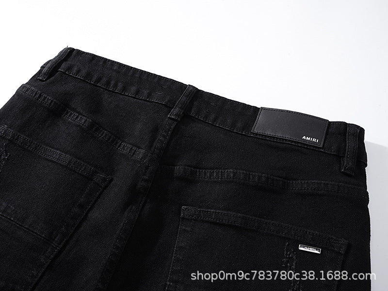 Amiri Distressed Splash Ink Stretch Slim Tapered Denim Jeans Unisex