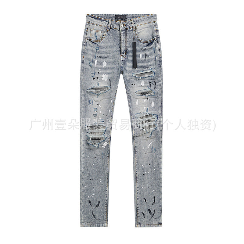Amiri Distressed Splash‑Ink Stretch Slim Tapered Denim Jeans Unisex