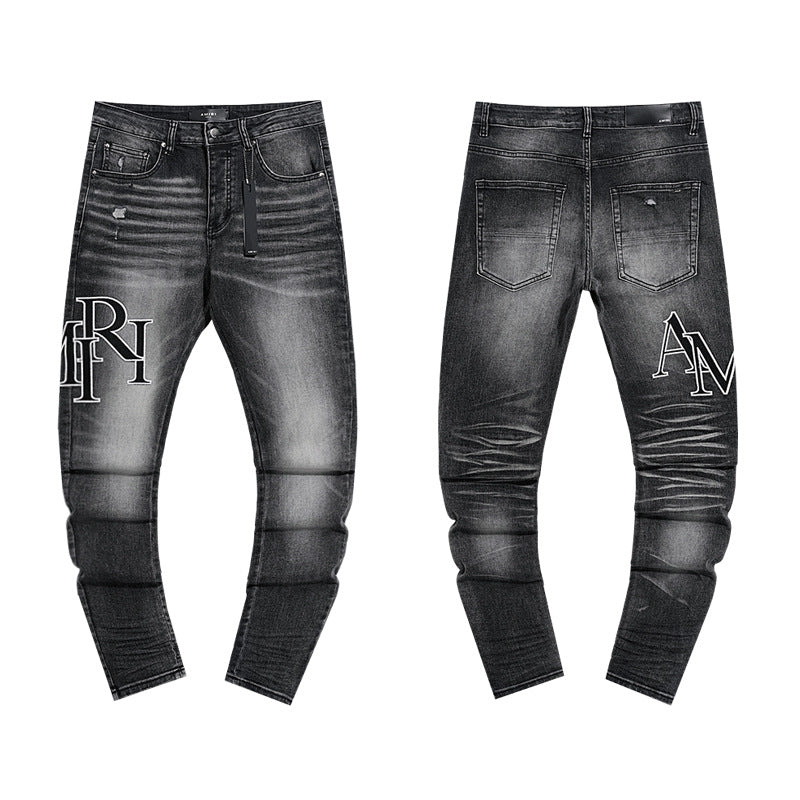 Amiri Distressed Splash Ink Stretch Slim Tapered Denim Jeans Unisex